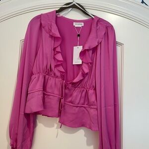 NWT. Size small. Lovers and friends, pink blouse.